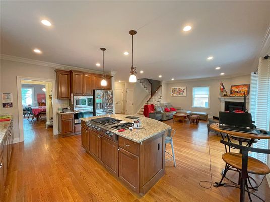 Dining room, Fireplace, Interior, Kitchen, Living room, Pendant Lights, Recessed Lighting, Stainless Steel Appliances, Wood Texture Flooring