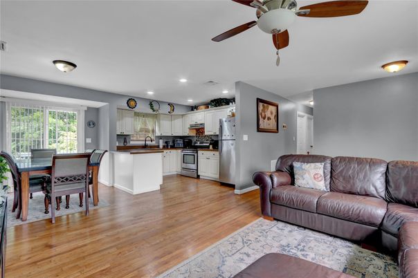 Dining room, Interior, Kitchen, Recessed Lighting, Stainless Steel Appliances, Wood Texture Flooring