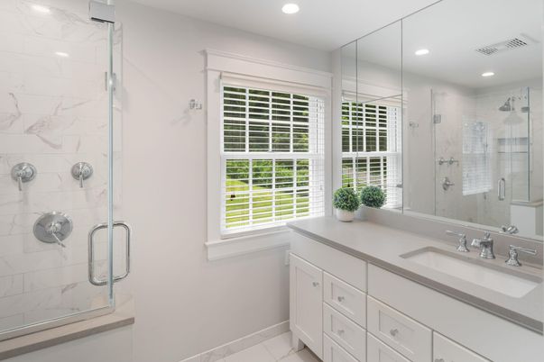 Bathroom, Dual Sink Vanities, Glass Shower, Interior, Marble Walls, Recessed Lighting
