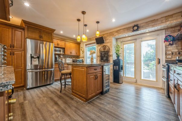 Interior, Kitchen, Pendant Lights, Recessed Lighting, Stainless Steel Appliances, Stone Walls, Wood Texture Flooring