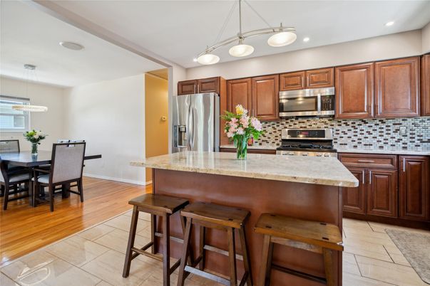 Dining room, Interior, Kitchen, Pendant Lights, Recessed Lighting, Stainless Steel Appliances, Wood Texture Flooring