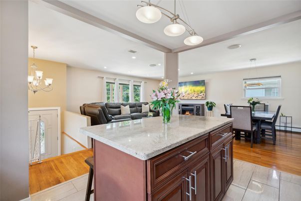 Chandelier, Dining room, Fireplace, Interior, Kitchen, Living room, Pendant Lights, Recessed Lighting, Wood Texture Flooring