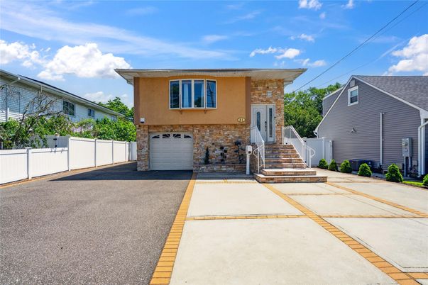Attached, Exterior, Facade, Raised Ranch