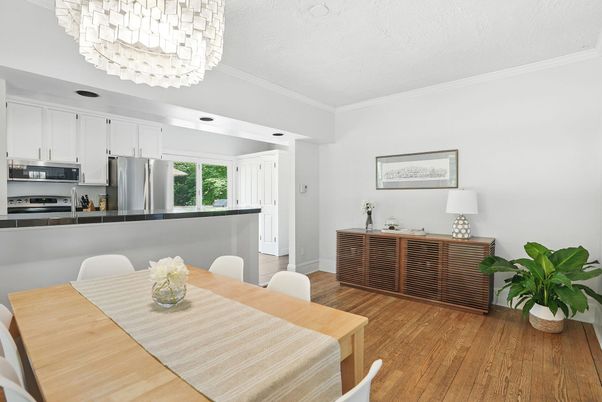 Chandelier, Dining room, Interior, Kitchen, Stainless Steel Appliances, Wood Texture Flooring