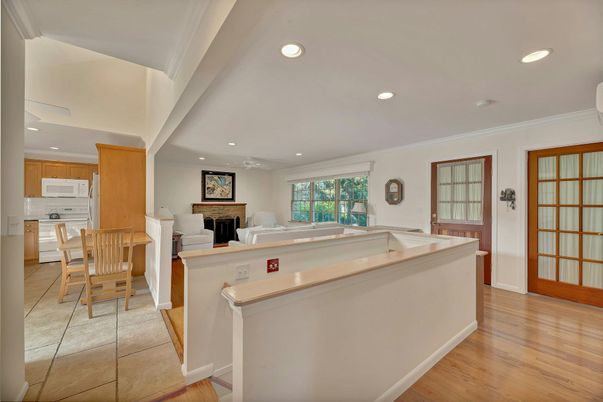 Dining room, Fireplace, Interior, Kitchen, Recessed Lighting, Wood Texture Flooring