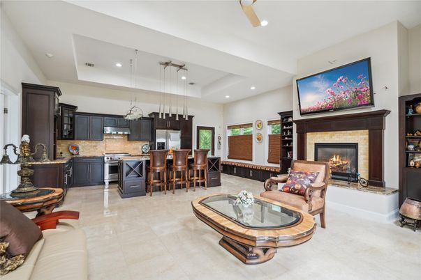 Fireplace, Interior, Kitchen, Living room, Pendant Lights, Recessed Lighting, Stainless Steel Appliances