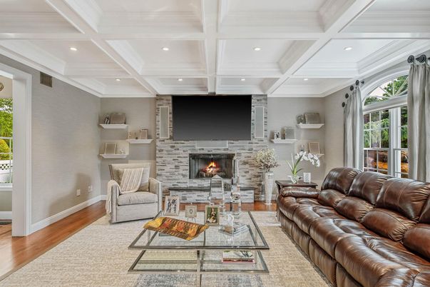Fireplace, Interior, Living room, Recessed Lighting, Stone Walls, Wood Texture Flooring
