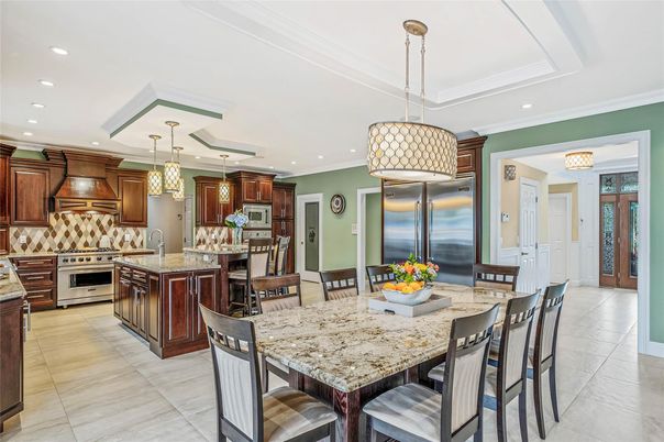 Chandelier, Dining room, Interior, Kitchen, Pendant Lights, Recessed Lighting, Stainless Steel Appliances