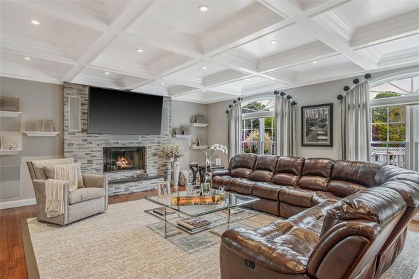 Fireplace, Interior, Living room, Recessed Lighting, Stone Walls, Wood Texture Flooring