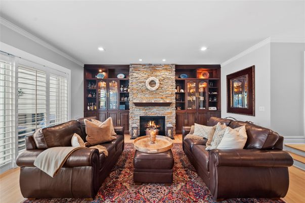 Fireplace, Interior, Living room, Recessed Lighting, Stone Walls, Wood Texture Flooring