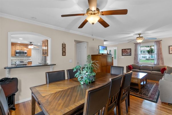 Dining room, Interior, Kitchen, Living room, Recessed Lighting, Stainless Steel Appliances, Wood Texture Flooring