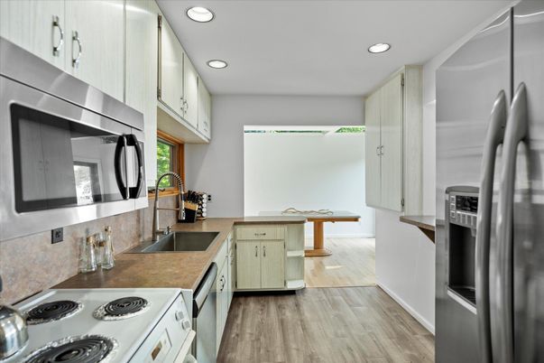 Interior, Kitchen, Recessed Lighting, Stainless Steel Appliances, Wood Texture Flooring