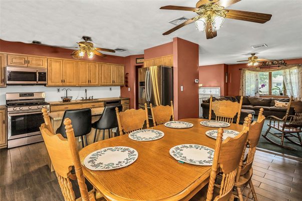 Dining room, Interior, Kitchen, Living room, Stainless Steel Appliances, Wood Texture Flooring