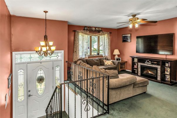 Chandelier, Fireplace, Interior, Living room