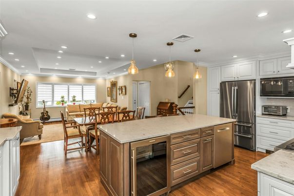 Dining room, Interior, Kitchen, Pendant Lights, Recessed Lighting, Stainless Steel Appliances, Wood Texture Flooring