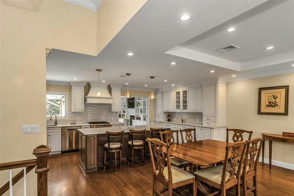 Dining room, Interior, Kitchen, Pendant Lights, Recessed Lighting, Stainless Steel Appliances, Wood Texture Flooring
