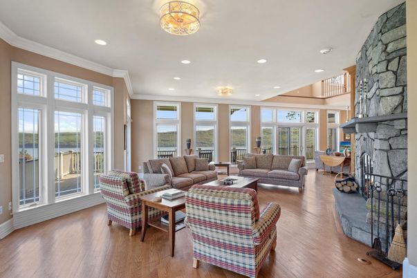Fireplace, Interior, Living room, Recessed Lighting, Stone Walls, Wood Texture Flooring