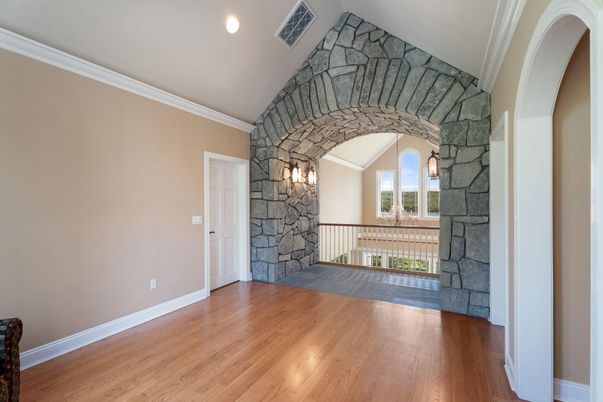 Fireplace, Interior, Recessed Lighting, Stone Walls, Wood Texture Flooring