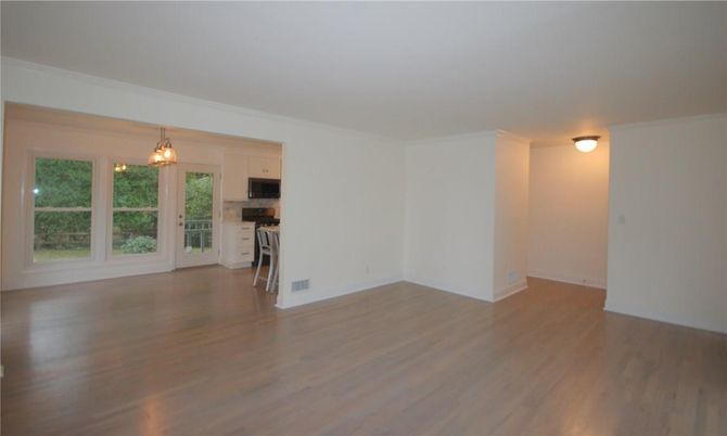 Empty room, Interior, Kitchen, Pendant Lights, Stainless Steel Appliances, Wood Texture Flooring