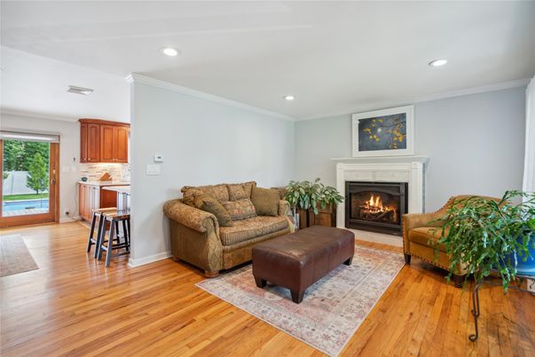 Fireplace, Interior, Living room, Recessed Lighting, Wood Texture Flooring