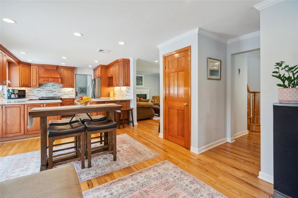 Dining room, Interior, Kitchen, Recessed Lighting, Stainless Steel Appliances, Wood Texture Flooring