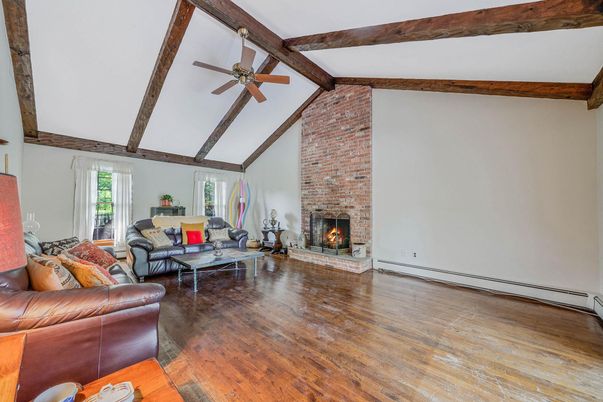 Fireplace, Interior, Living room, Stone Walls, Wooden Beams, Wood Texture Flooring