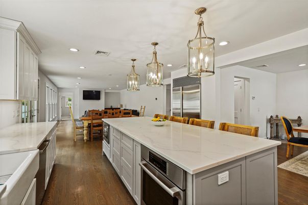 Dining room, Interior, Kitchen, Pendant Lights, Recessed Lighting, Stainless Steel Appliances, Wood Texture Flooring