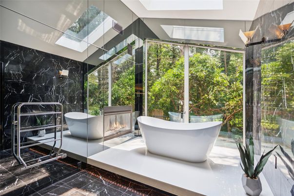 Bathroom, Fireplace, Free Standing Baths, Glass Shower, Interior, Marble, Marble Walls