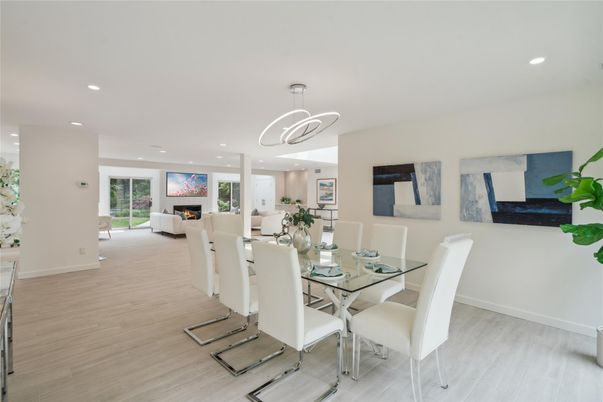 Dining room, Fireplace, Interior, Living room, Pendant Lights, Recessed Lighting, Wood Texture Flooring
