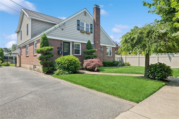 Exterior, Facade, Brick Facade, Cape Cod