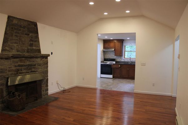 Fireplace, Interior, Kitchen, Recessed Lighting, Wood Texture Flooring