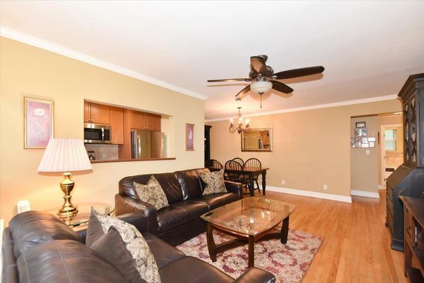 Chandelier, Dining room, Interior, Kitchen, Living room, Stainless Steel Appliances, Wood Texture Flooring