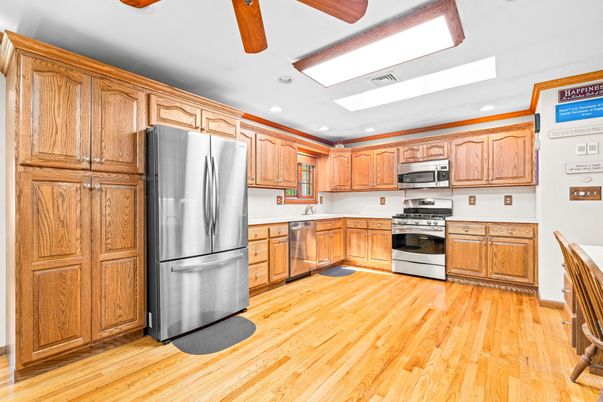 Interior, Kitchen, Recessed Lighting, Stainless Steel Appliances, Wood Texture Flooring