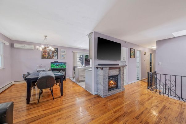 Chandelier, Dining room, Fireplace, Interior, Wood Texture Flooring