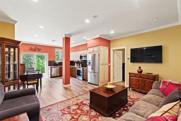 Dining room, Interior, Kitchen, Living room, Recessed Lighting, Stainless Steel Appliances, Wood Texture Flooring