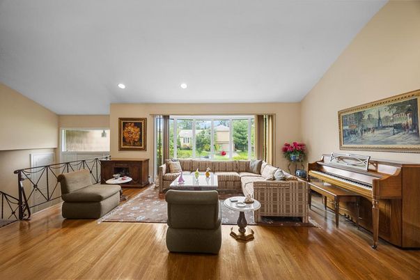 Fireplace, Interior, Living room, Piano, Recessed Lighting, Wood Texture Flooring