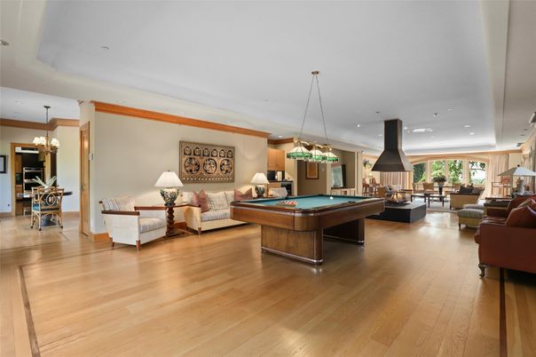 Billiard Table, Chandelier, Game Room, Interior, Living room, Pendant Lights, Recessed Lighting, Wood Texture Flooring