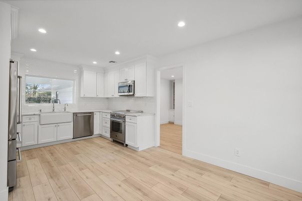 Interior, Kitchen, Recessed Lighting, Stainless Steel Appliances, Wood Texture Flooring