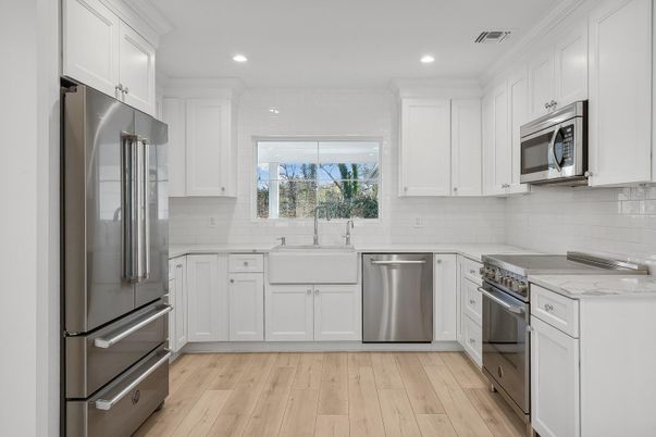 Interior, Kitchen, Recessed Lighting, Stainless Steel Appliances, Wood Texture Flooring