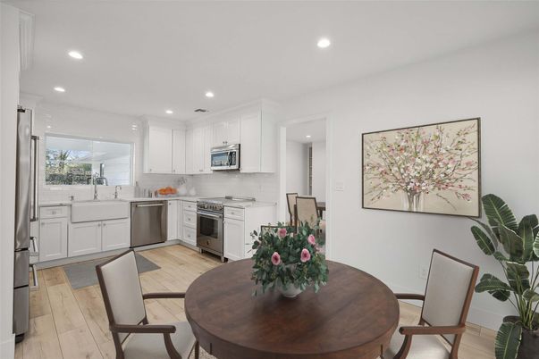 Dining room, Interior, Kitchen, Recessed Lighting, Stainless Steel Appliances, Wood Texture Flooring