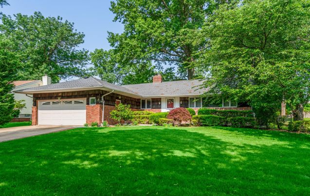 Attached, Backyard, Exterior, Facade, Brick Facade, Ranch