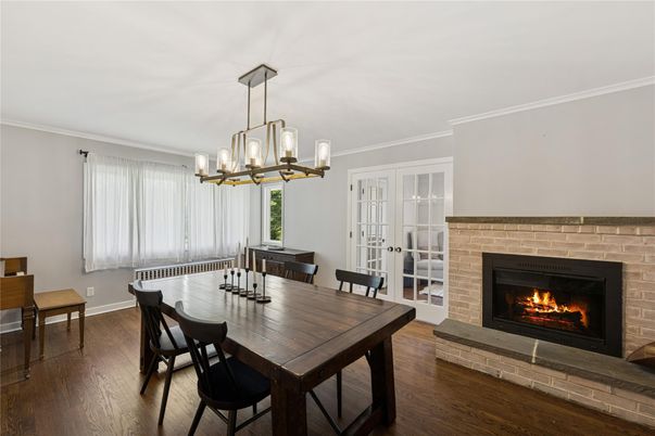 Dining room, Fireplace, Interior, Pendant Lights, Wood Texture Flooring