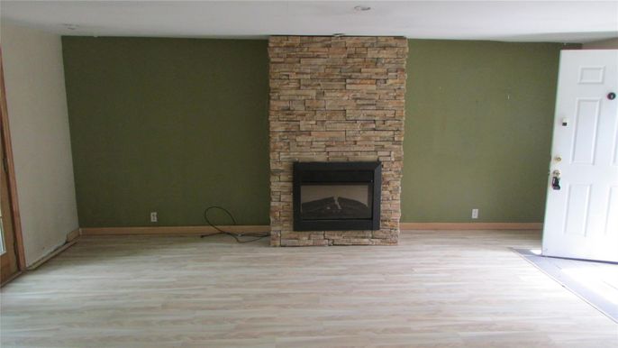 Empty room, Fireplace, Interior, Stone Walls, Wood Texture Flooring