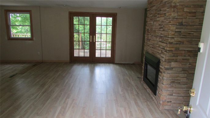 Empty room, Fireplace, Interior, Stone Walls, Wood Texture Flooring