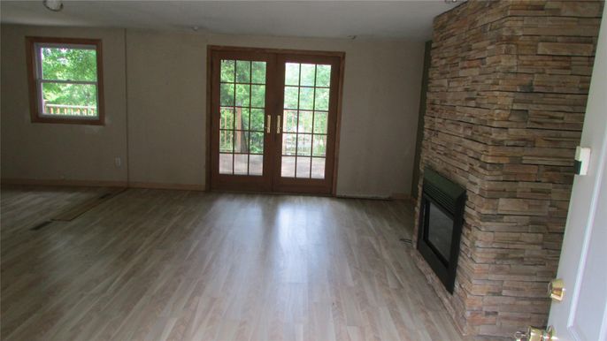 Empty room, Fireplace, Interior, Stone Walls, Wood Texture Flooring