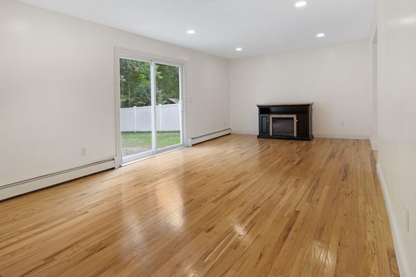 Empty room, Fireplace, Interior, Recessed Lighting, Wood Texture Flooring