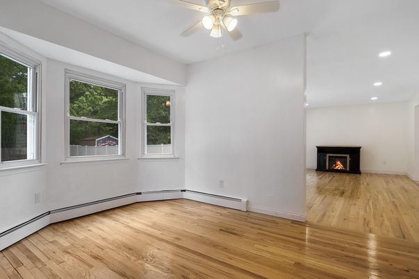 Empty room, Fireplace, Interior, Recessed Lighting, Wood Texture Flooring