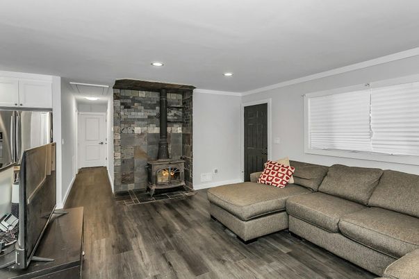 Fireplace, Interior, Living room, Recessed Lighting, Wood Texture Flooring