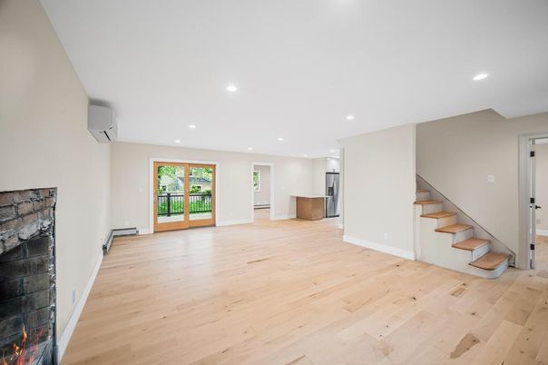Empty room, Fireplace, Interior, Kitchen, Recessed Lighting, Wood Texture Flooring