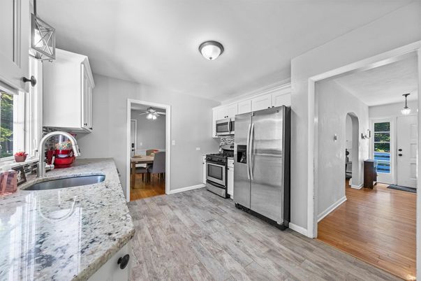 Dining room, Interior, Kitchen, Pendant Lights, Stainless Steel Appliances, Wood Texture Flooring